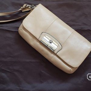 Coach beige leather clutch/wristlet